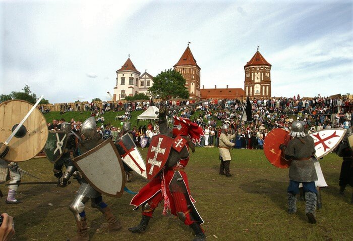 Joust Representing Medieval fights of Mir in Front of Castle